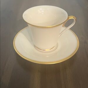 Elegant White and Gold Teacup and Saucer